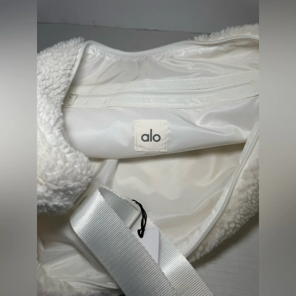 Alo Yoga Sherpa On The Go Sling Bag in ivory